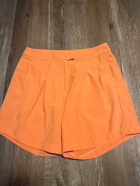 Nike Dri Fit Women's Bright Orange High-Waist Pleated Shorts